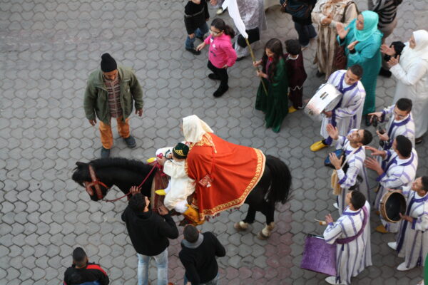 A Moroccan boy child going through the ritual horse ride (rekba), before the circumcision ceremony. The picture has been taken during a long-term ethnophotographic observation of infant rituals, in the city of Mohammedia (Morocco), on January 28, 2013.