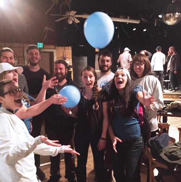 people celebrating Anthropology Day with balloons