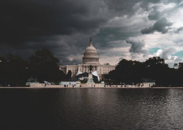 Dome Building Near Body Of Water Under Cloudy Sky