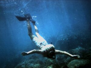 underwater photo of Rick, free diving off Small Malaita, Solomon Islands